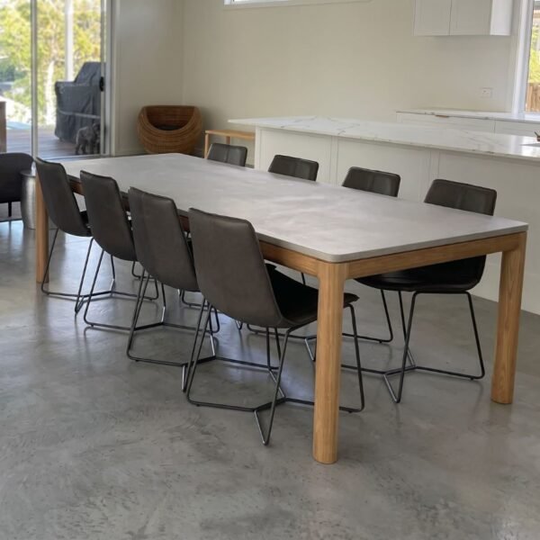 ARCH Concrete Dining Table by Slabs by Design Set in Steel