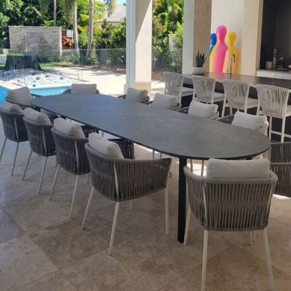 Lunar Concrete Dining Table by Slabs by Design Set in Steel