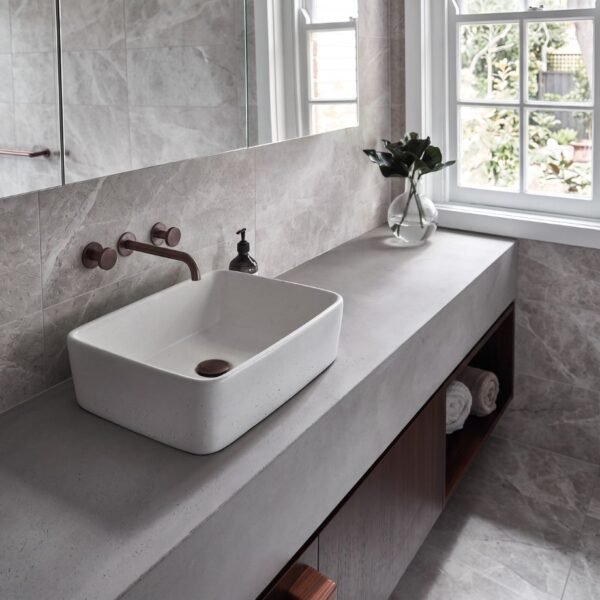 Plateau Concrete Vanity top by Slabs by Design Set in Steel